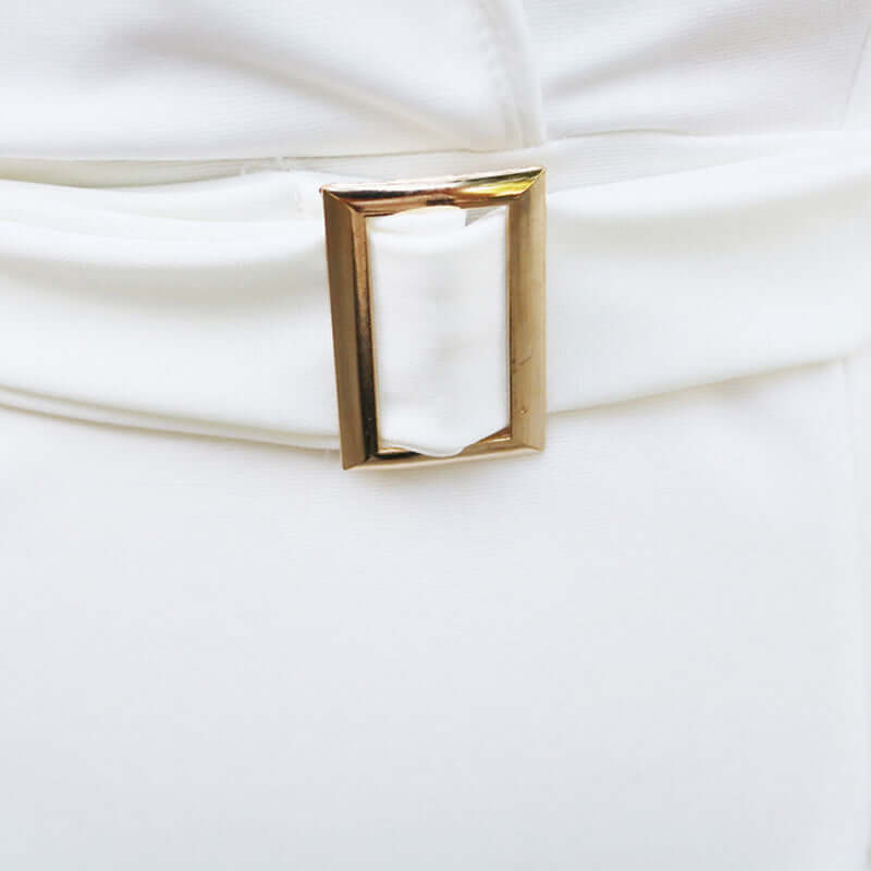 Close-up of the belt buckle on the Women's Solid Color Blazer V-Neck Dress With Belt & Hem, showcasing its elegant design.